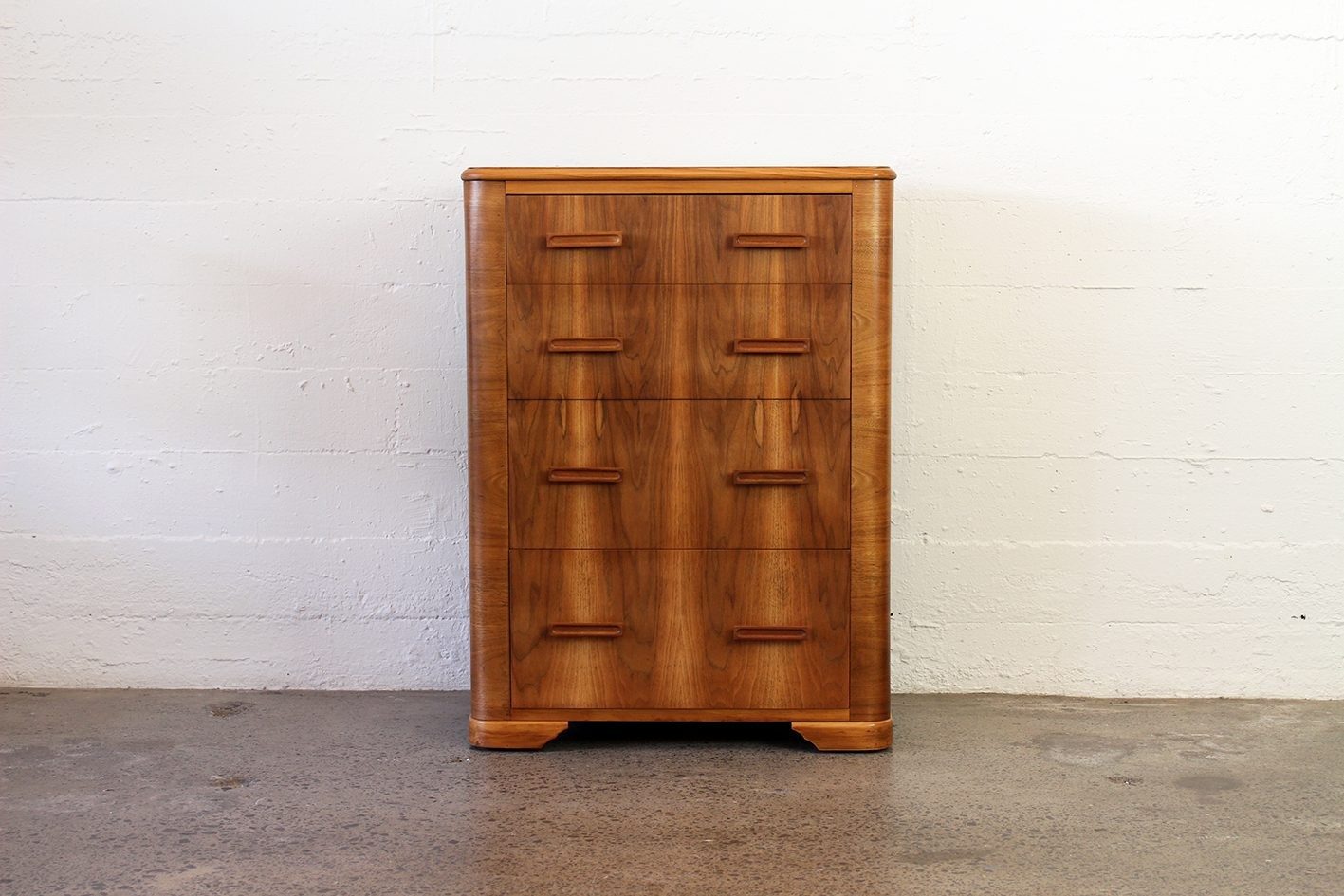 Vintage teak and mahogany tallboy