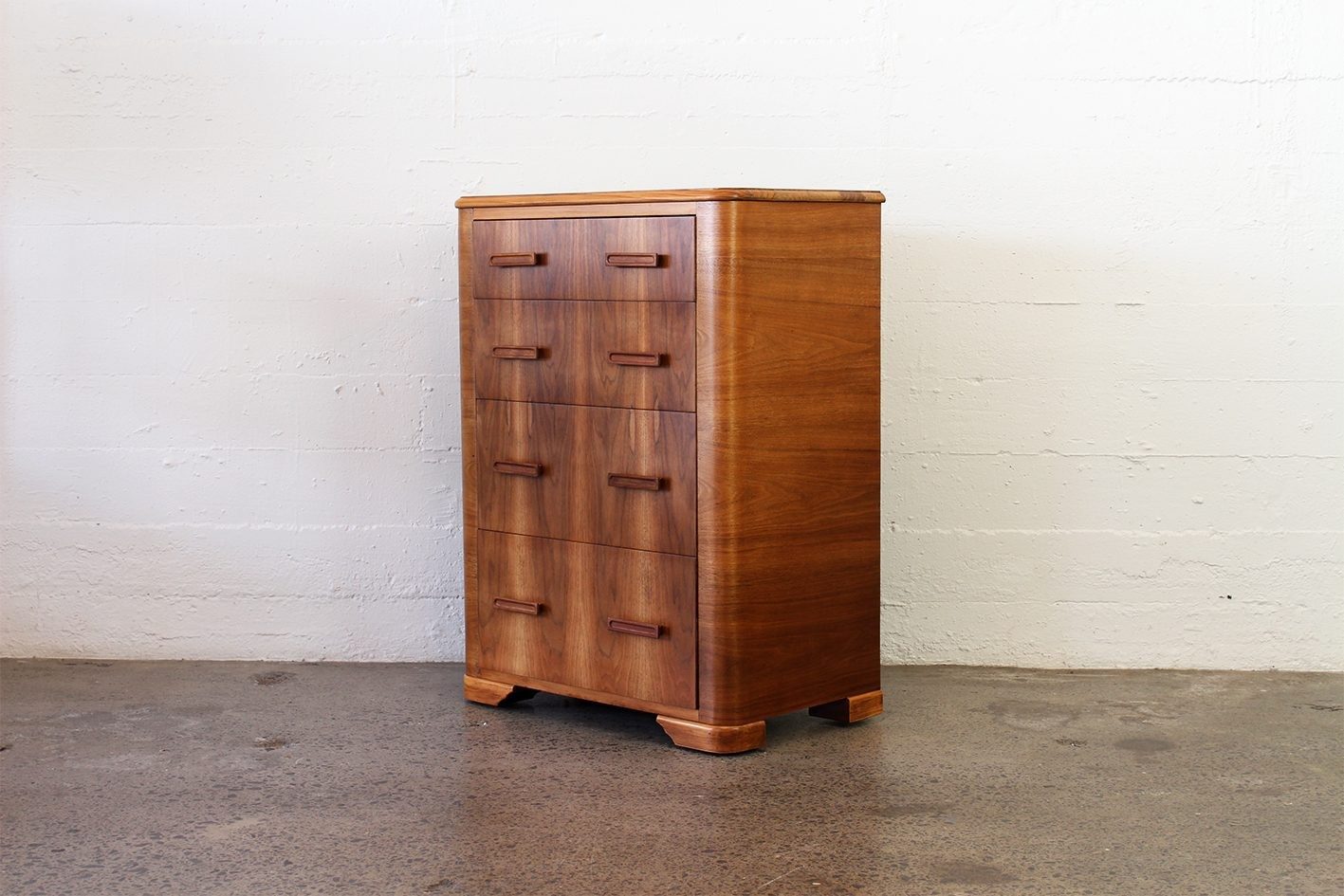 Vintage teak and mahogany tallboy