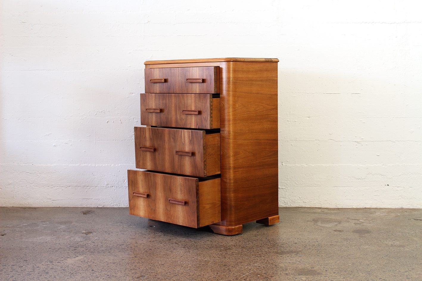 Vintage teak and mahogany tallboy