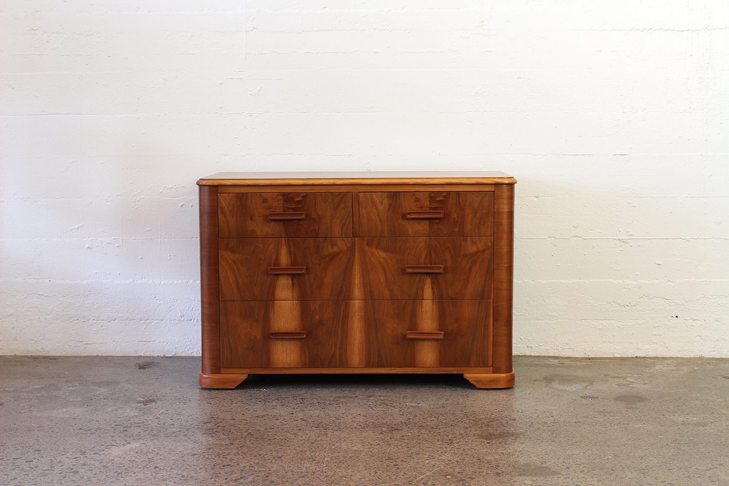 Vintage teak and mahogany lowboy