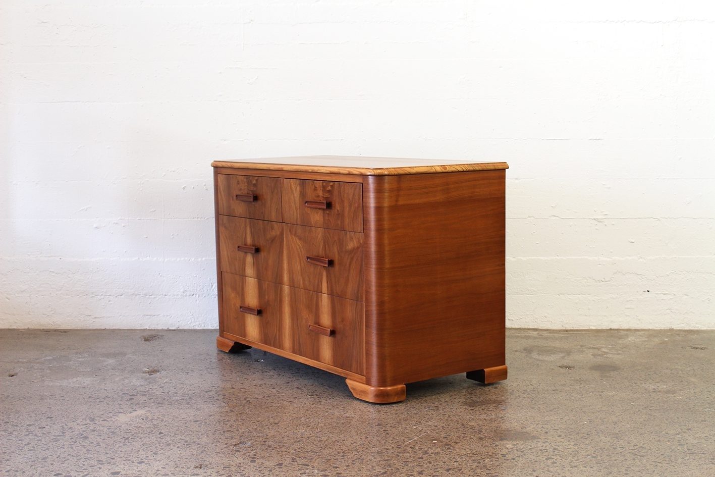 Vintage teak and mahogany lowboy