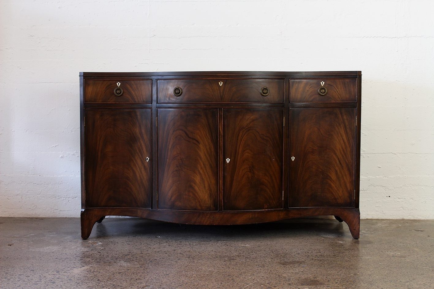 Vintage serpentine sideboard