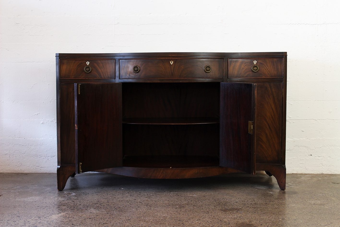 Vintage serpentine sideboard