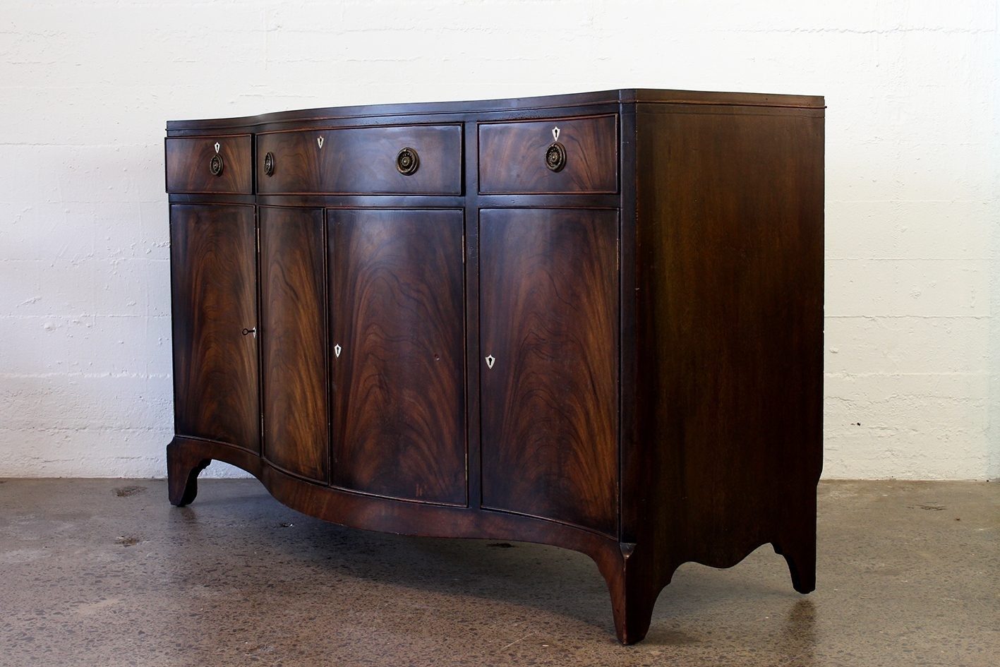 Vintage serpentine sideboard