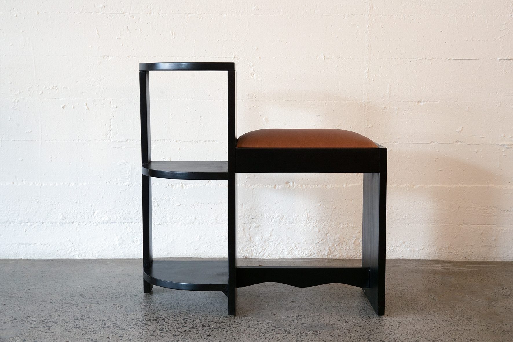 Vintage telephone table with curved shelf